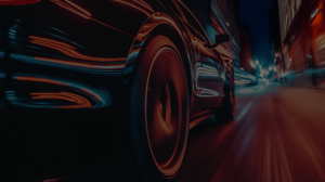 A close up of a car with lots of reflective light at night